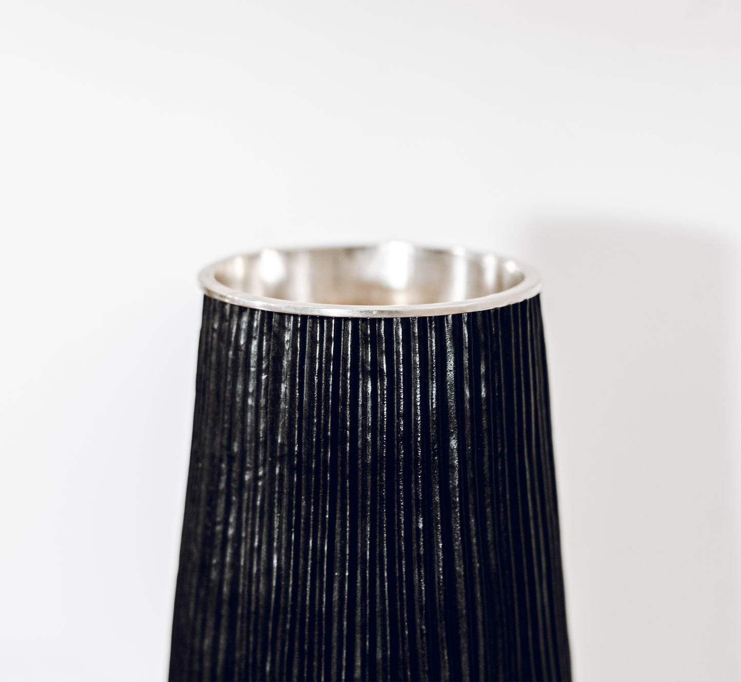 Hand built copper vase with silver interior by Adrian Hope