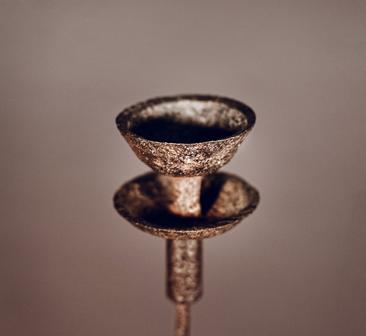 Cast iron candlestick