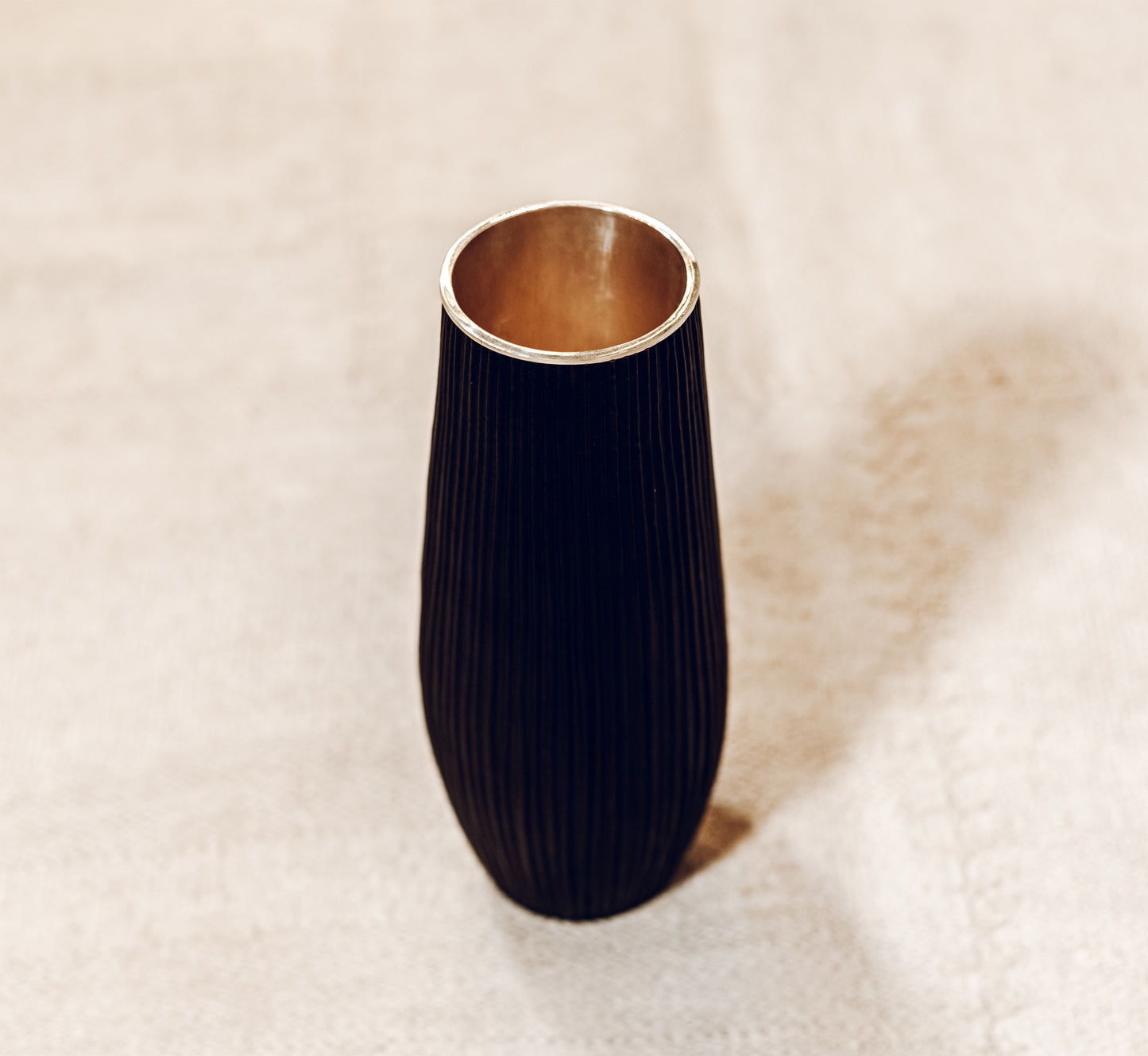 Hand built copper vase with silver interior by Adrian Hope