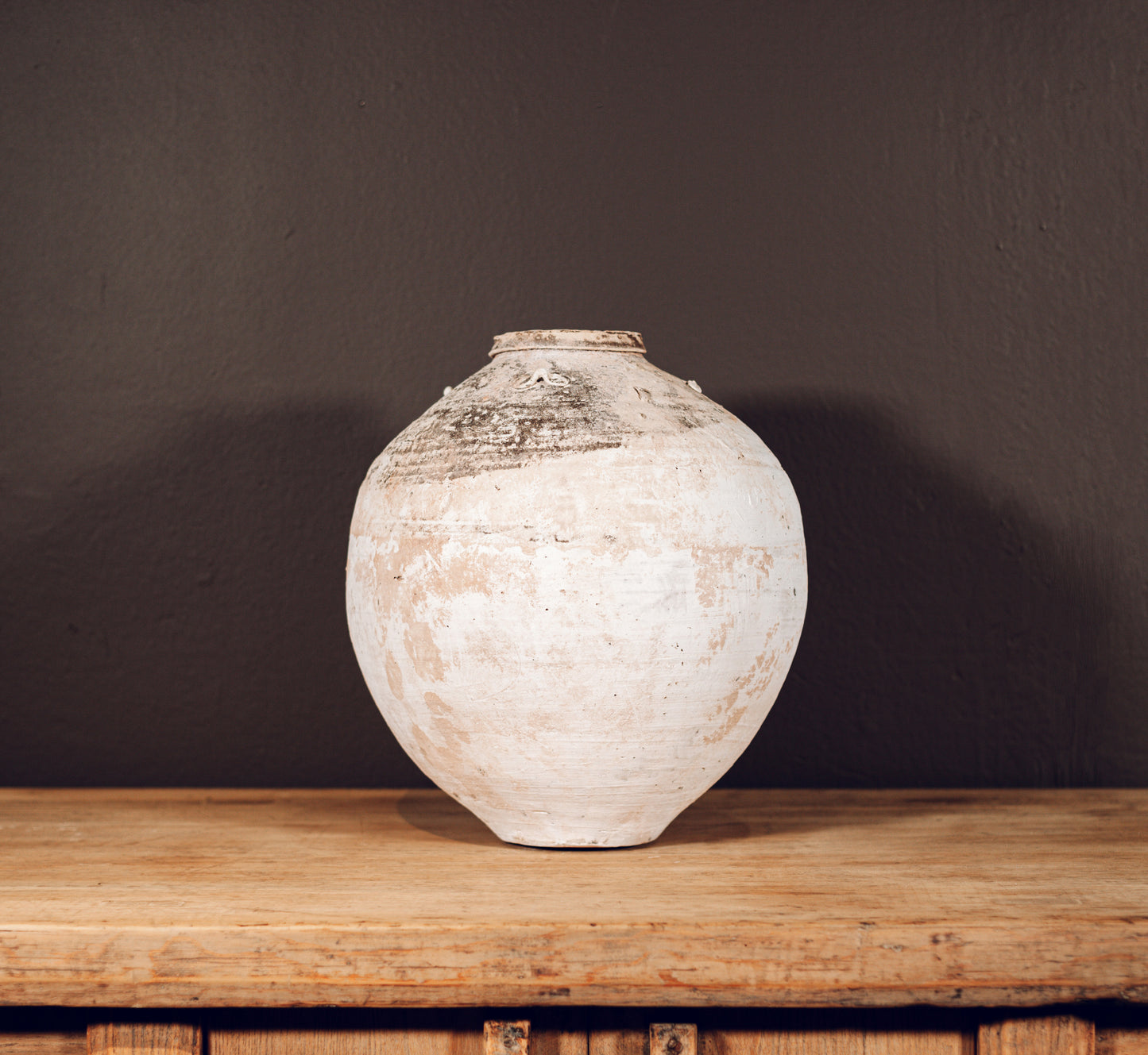 Large unglazed terracotta song jar, China, 17th century